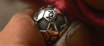 Close up of the Trollbeads silver football passion bead